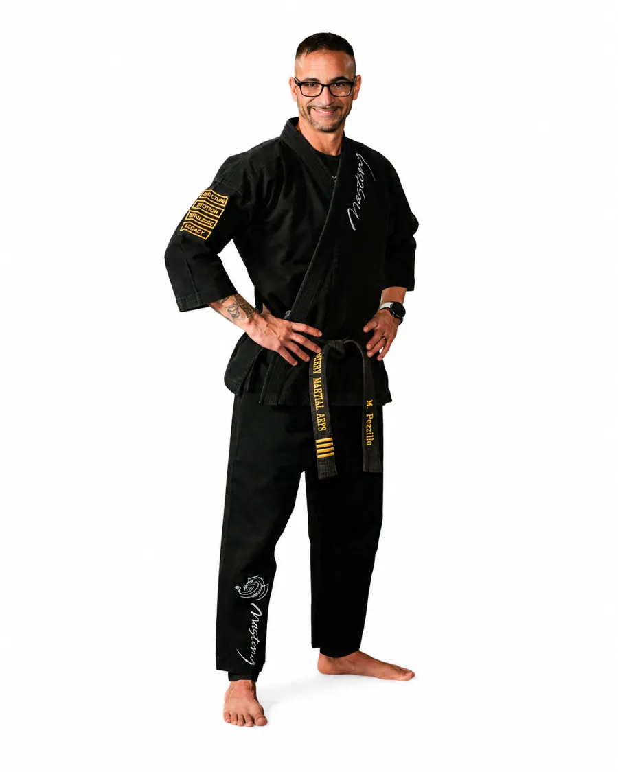 Mr. Pezzillo and Ms. Cotagis, Chief Instructors at Mastery Martial Arts East Greenwich